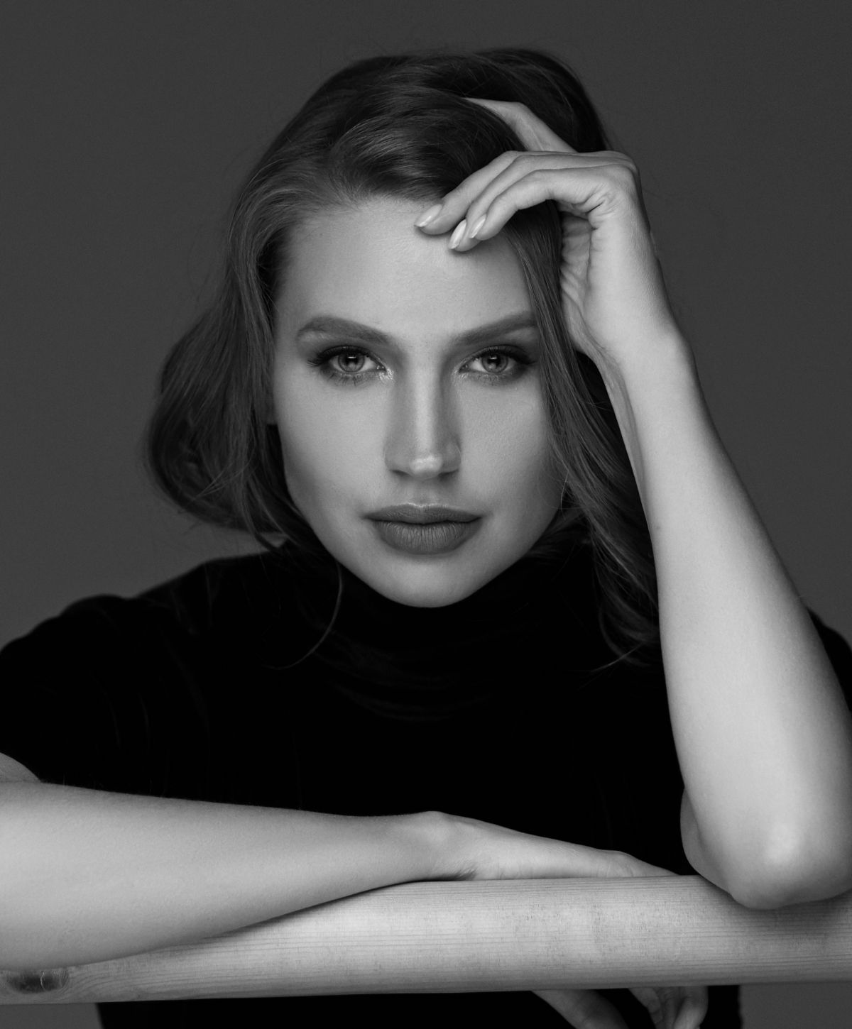 Franklin dermal fillers model with hand on her head