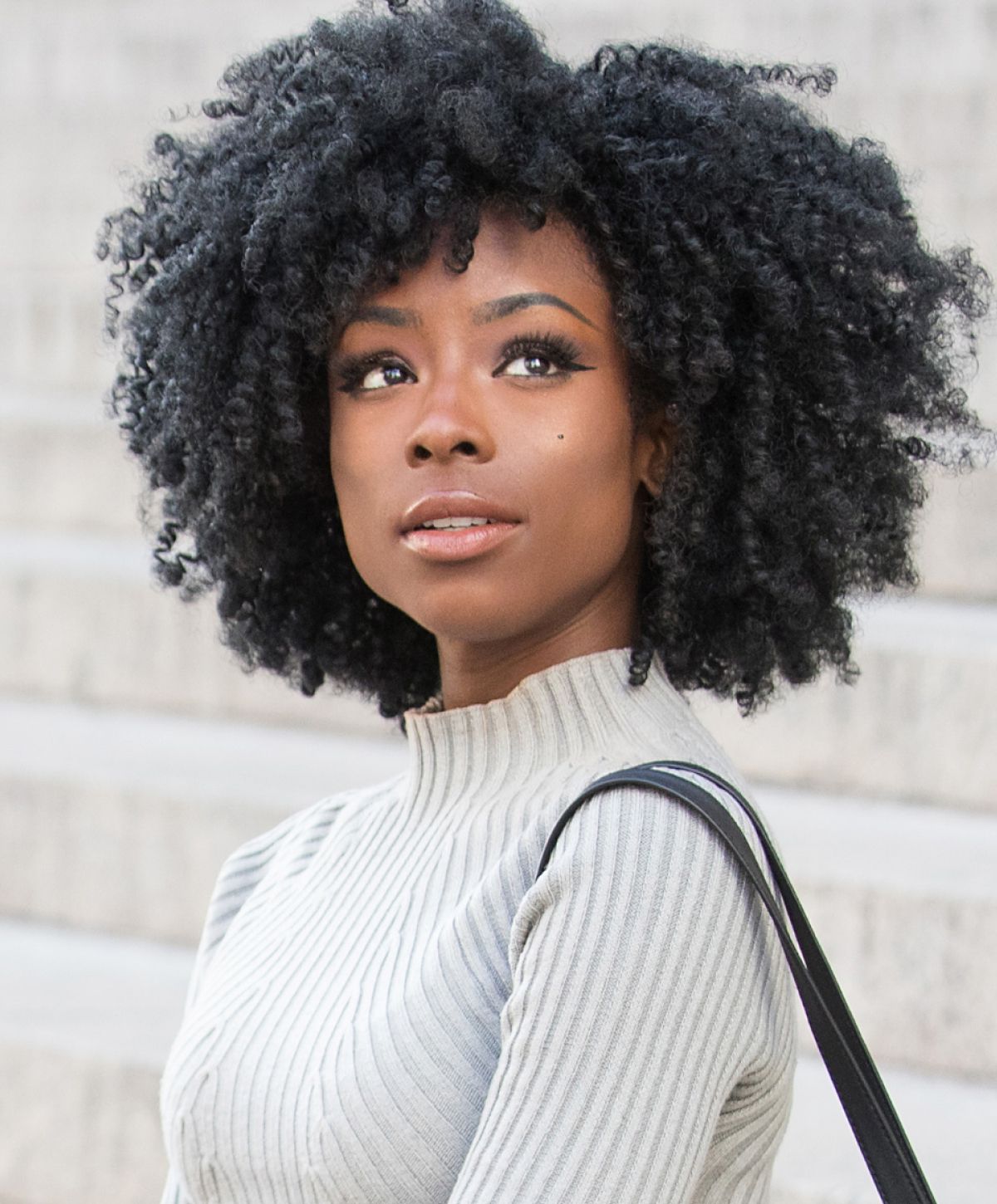 Franklin Collagen Induction Therapy in a white sweater