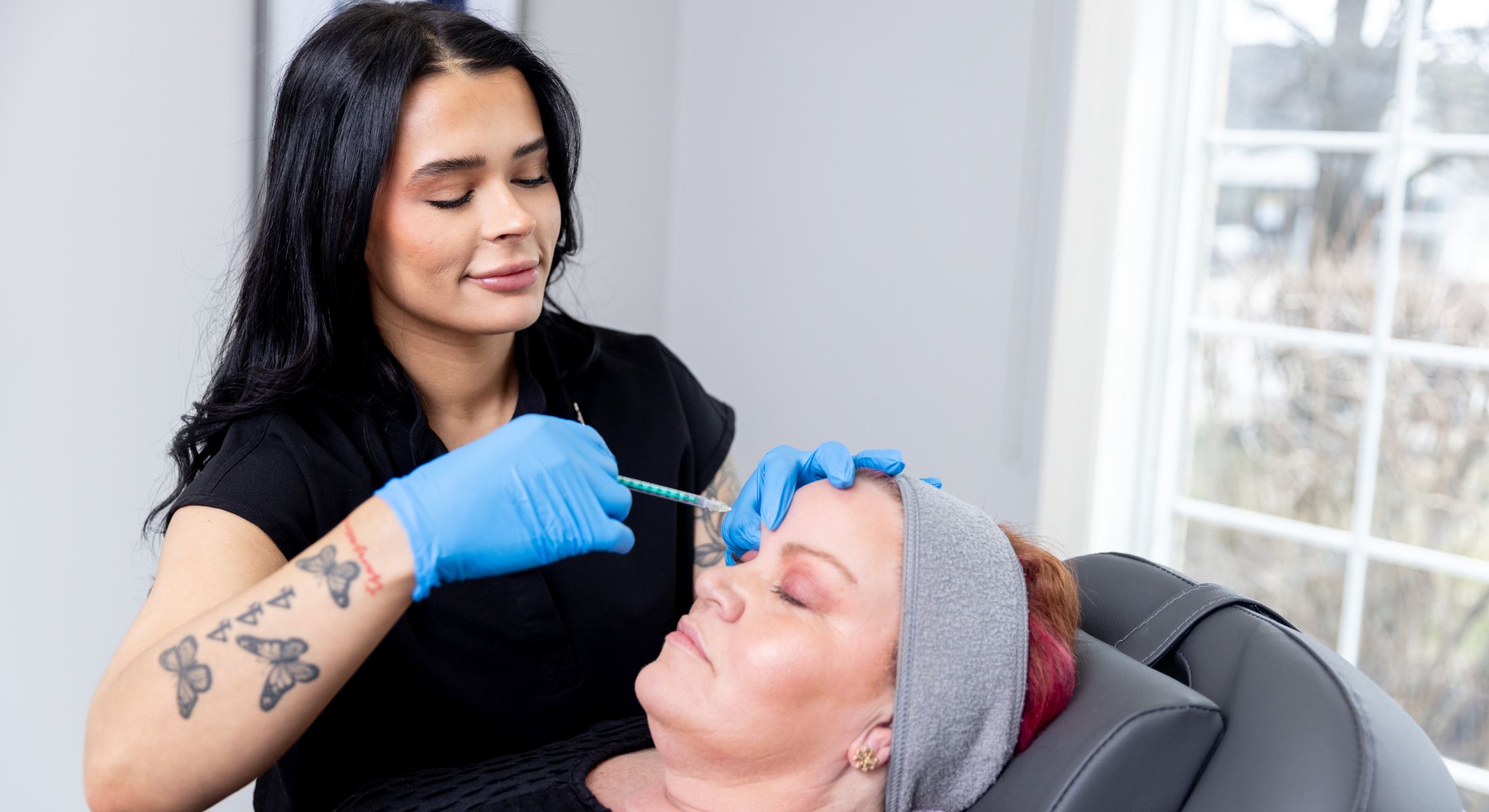 Franklin dermal fillers provider with a patient